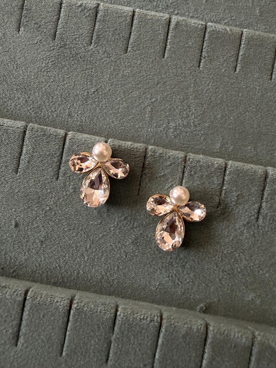 Pinkish pearl ear studs