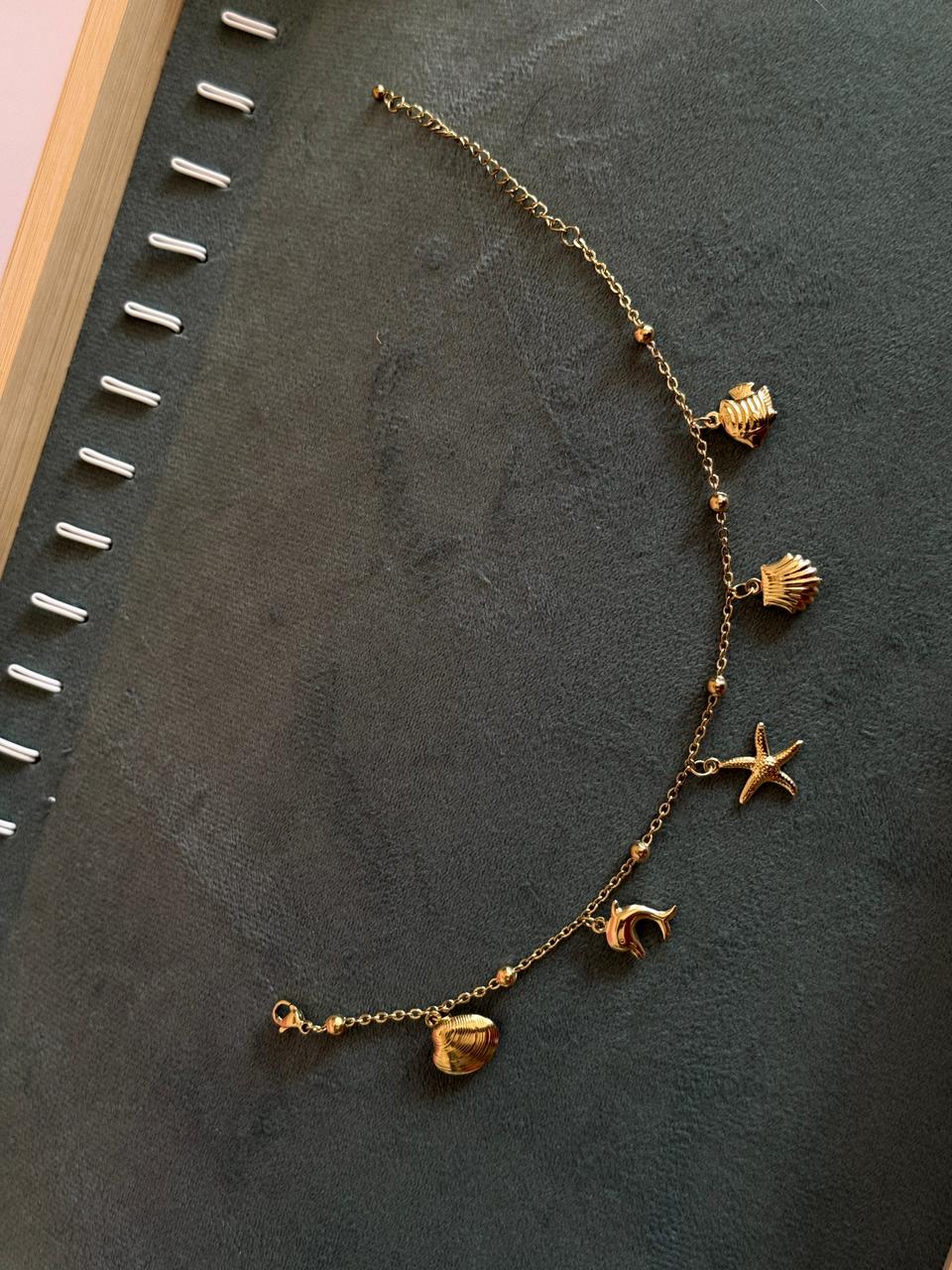 Star shell charm bracelet