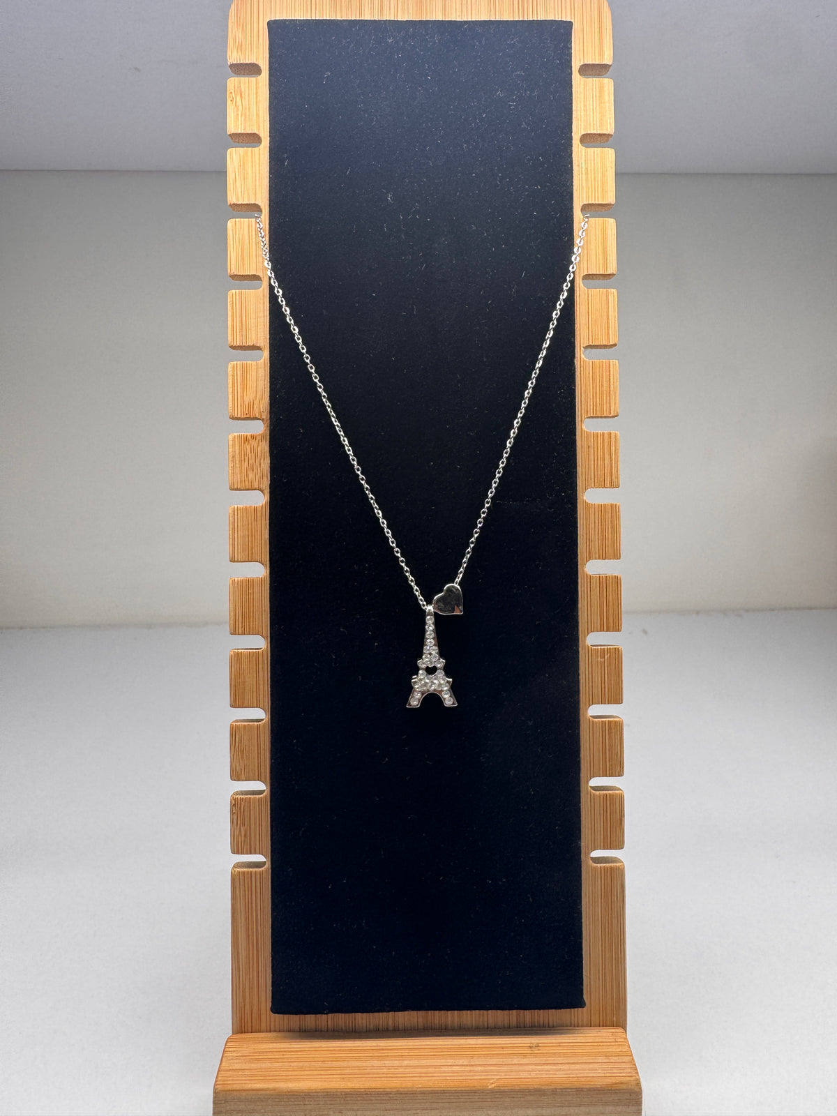 Eiffel Tower pendant necklace with a heart charm