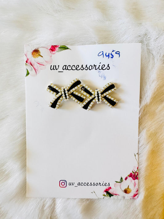 Black bow studs