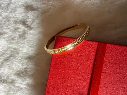 Gold carved kada baby