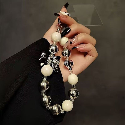 Silver bow beads phone charm