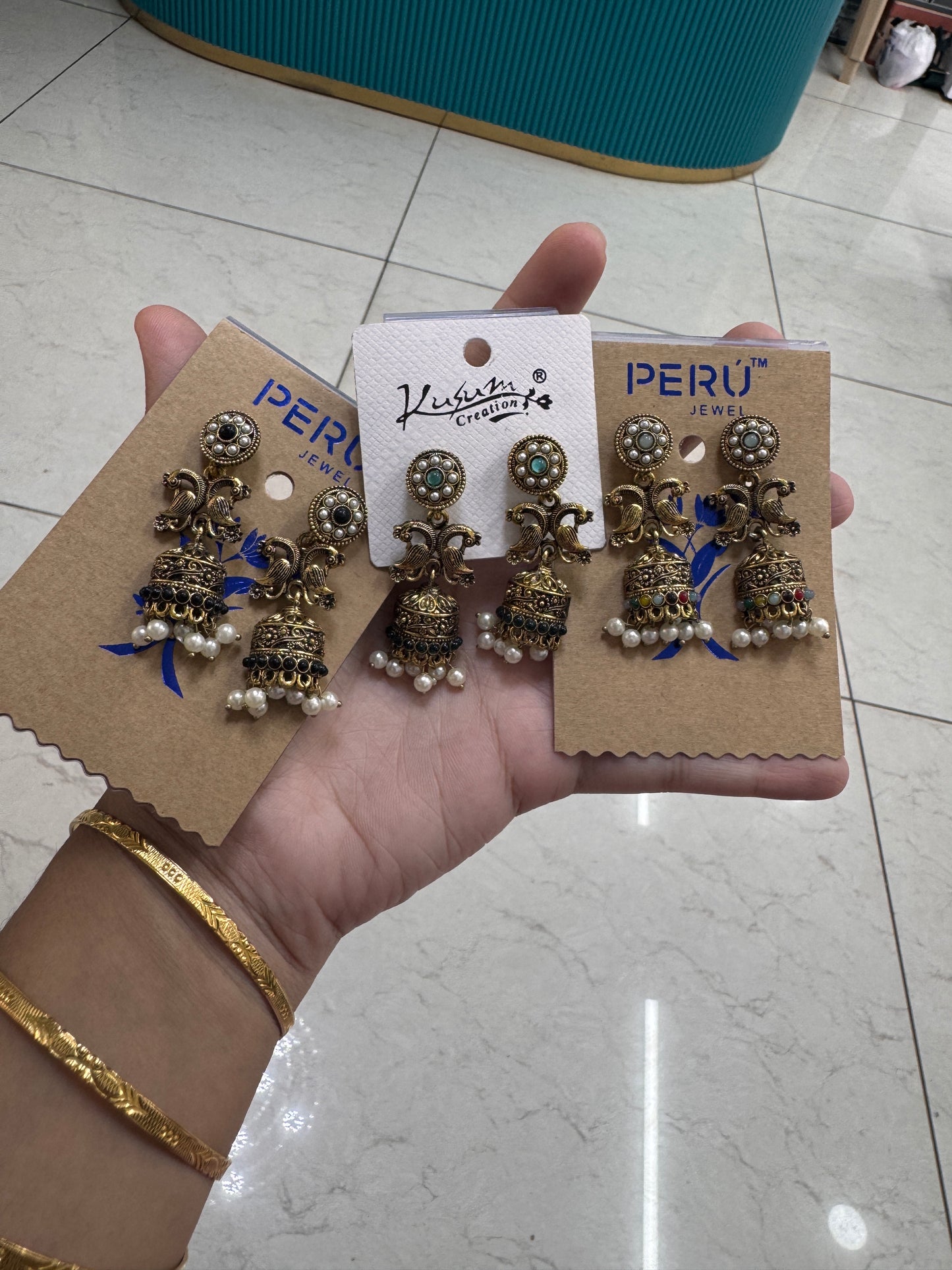 Peacock half jhumkas