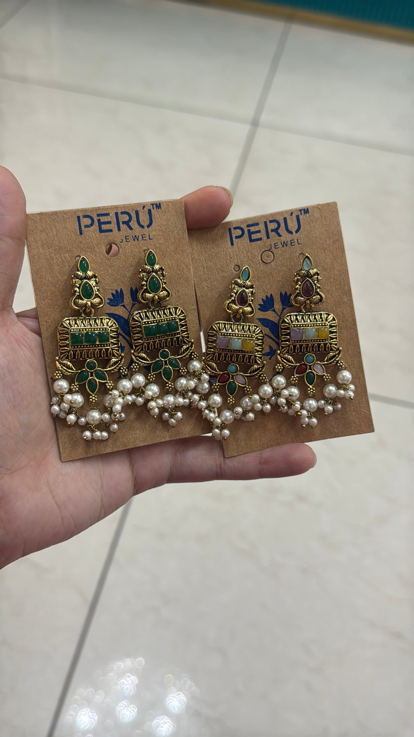 Gold pearl earrings