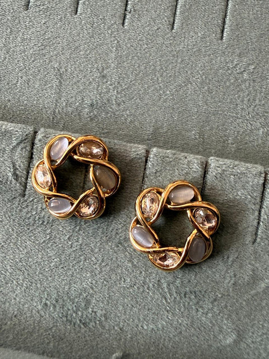 Stone studded flower ear studs