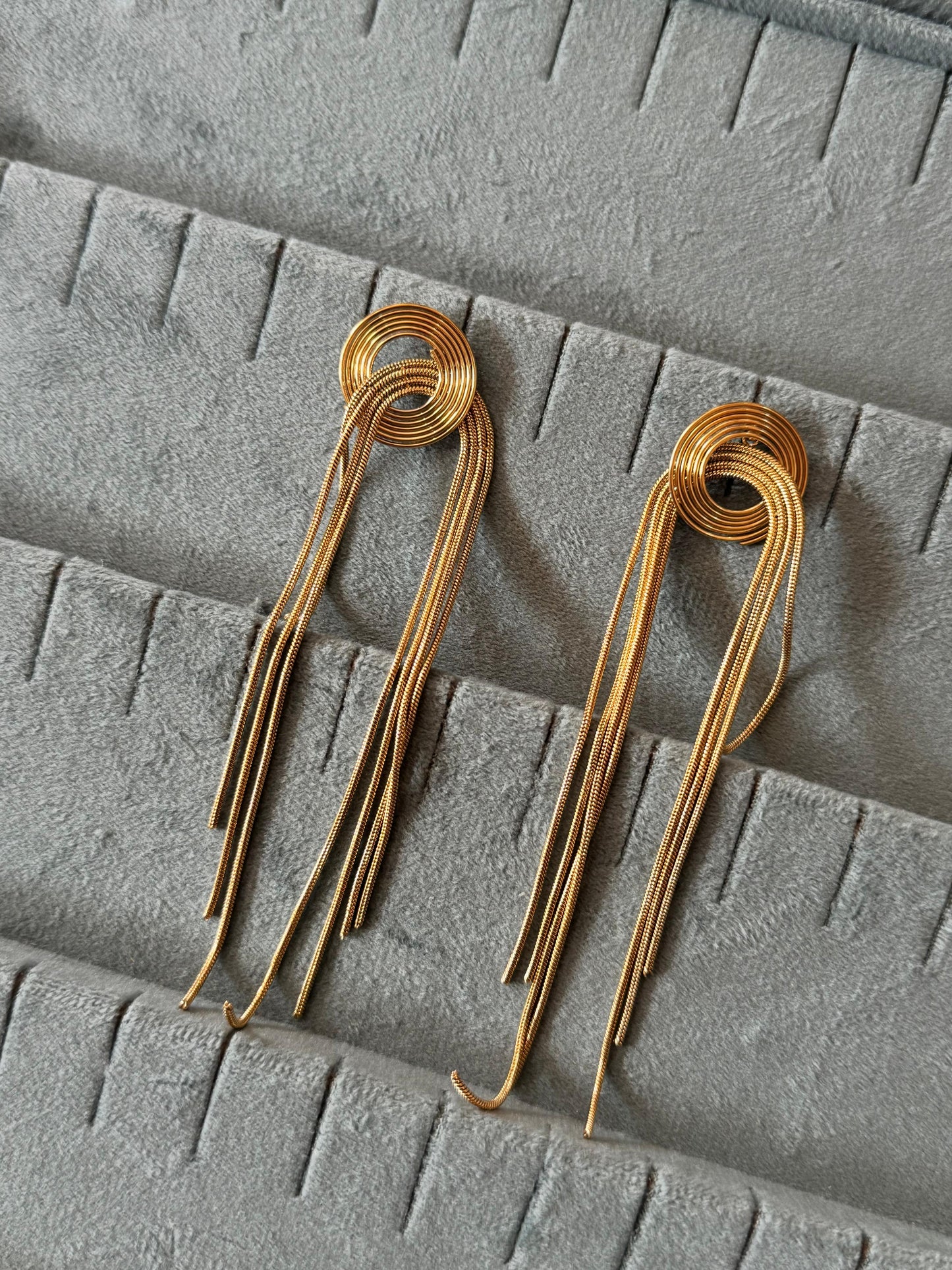 Gold round long earrings