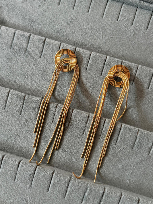 Gold round long earrings