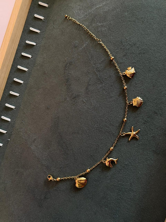 Star shell charm bracelet