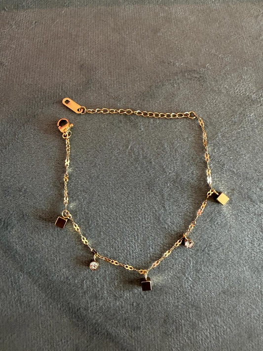 Stone gold charm bracelet